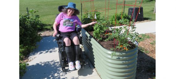 Angie with raised Vego Garden beds