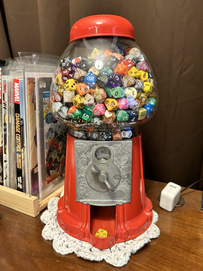 Gumball machine with dice