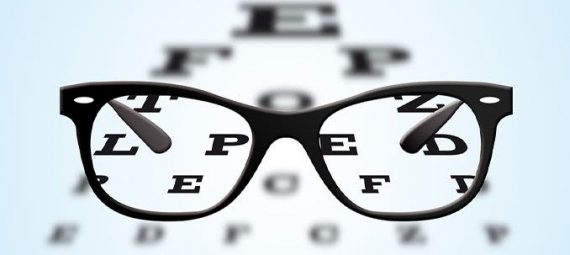 Eye Glasses looking at Eye Chart